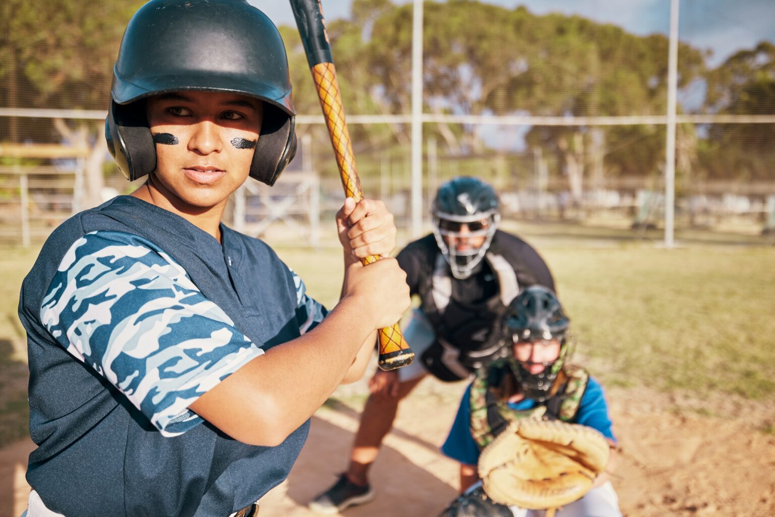 Teen in baseball uniform, a portrait of focus and motivation. Sport in high school can help fitness